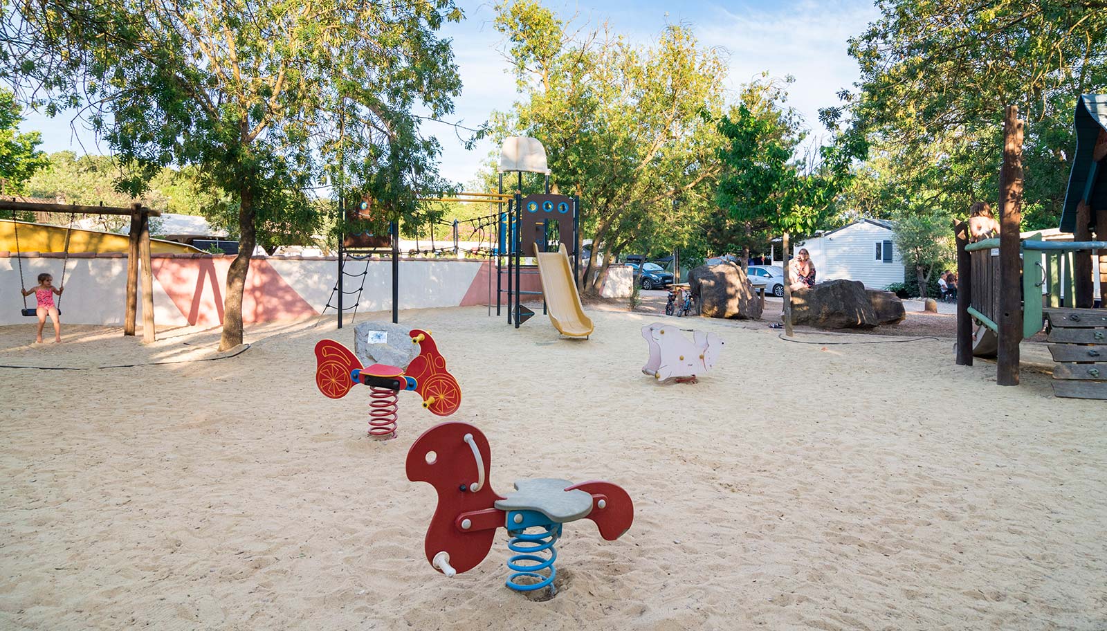 The playground for children at Les Rivières campsite in the Hérault