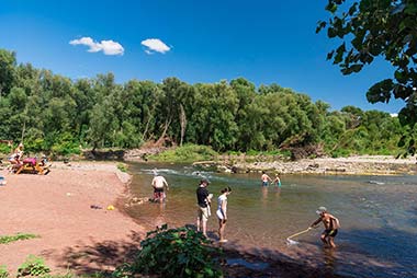 Bathers on a beach in Hérault near Les Rivières campsite