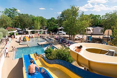 Water slides and swimming pool at Les Rivières campsite in Canet in Hérault