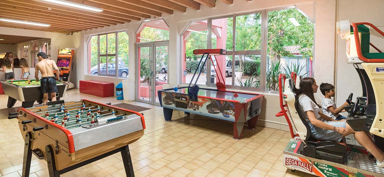 Billiards, video games and table football in the games room of the campsite near Salagou